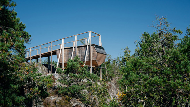 Arkitektriktat vindskydd vackert beläget i naturen