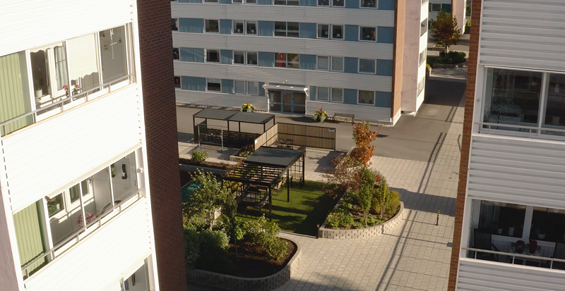 Utsikt över utemiljön i ett bostadsområde